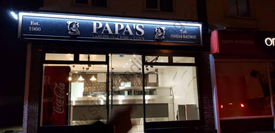 Papas illuminated at night